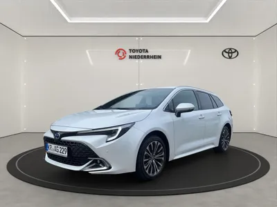 Toyota TOYOTA Corolla 1,8 Hybrid Teamplayer Touring Sports NAVI RFK LED KEYLESS im Auto Abo von Null-Leasing